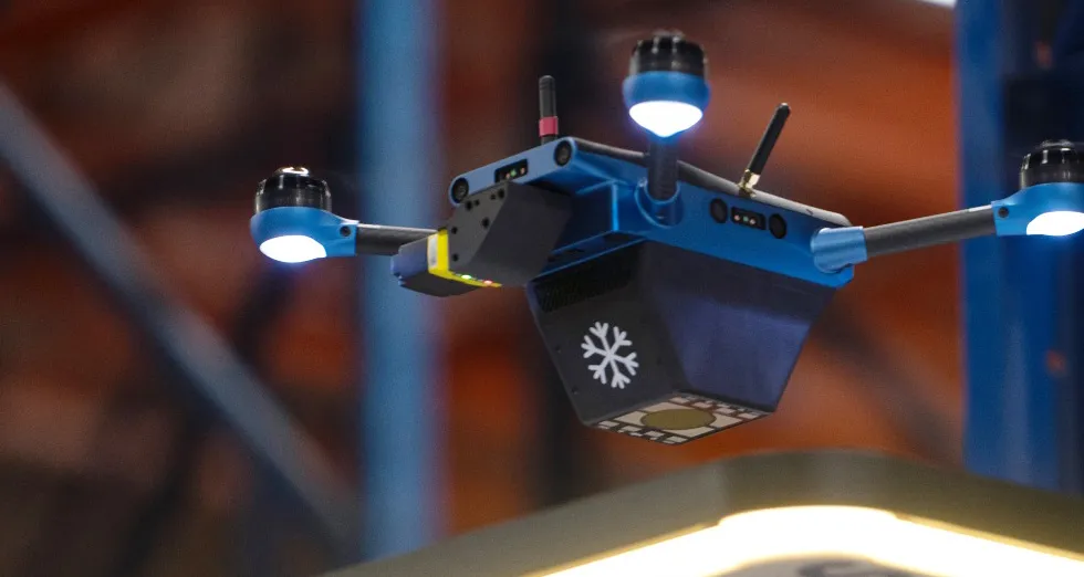 Corvus One Cold Chain variant — blue drone with snowflake logo for -20°F frozen warehouse operation